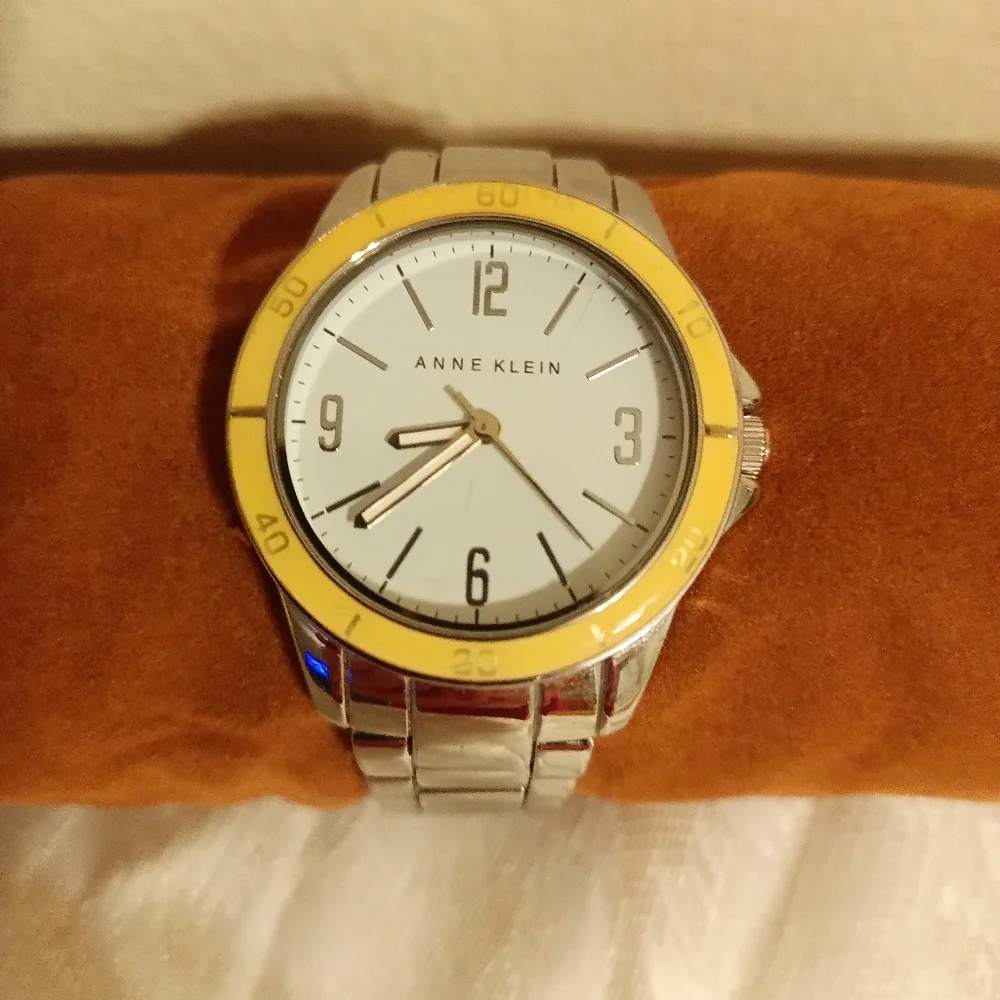 Anne Klein white face outer yellow/ tan second silver tone women's watch
